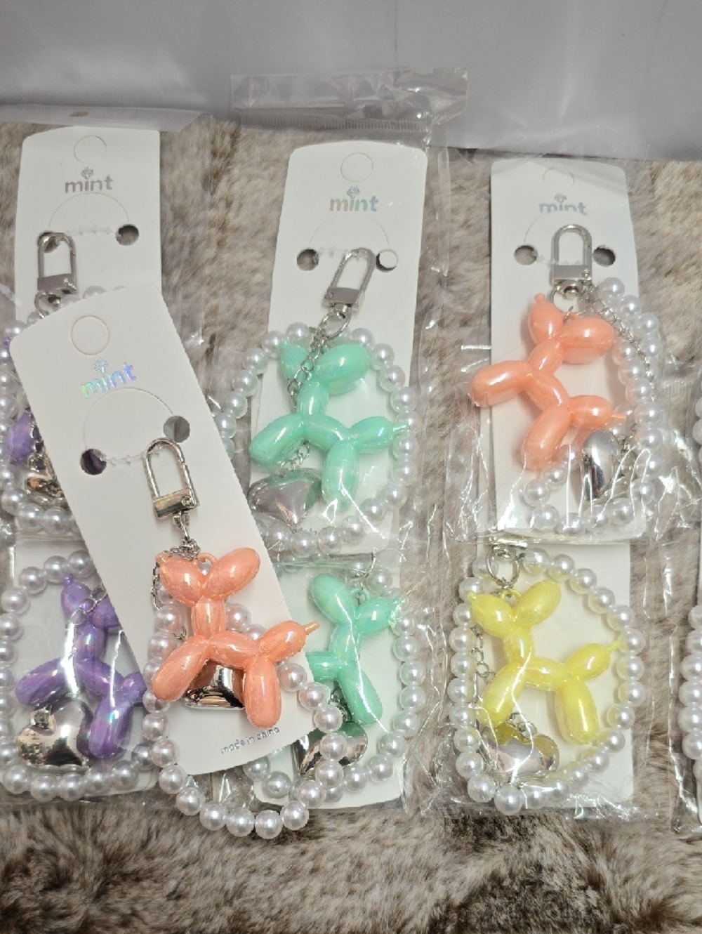Mint Kids Balloon Dog Keychain - Peach, Mint, Yellow, Purple - Picture 2 of 3